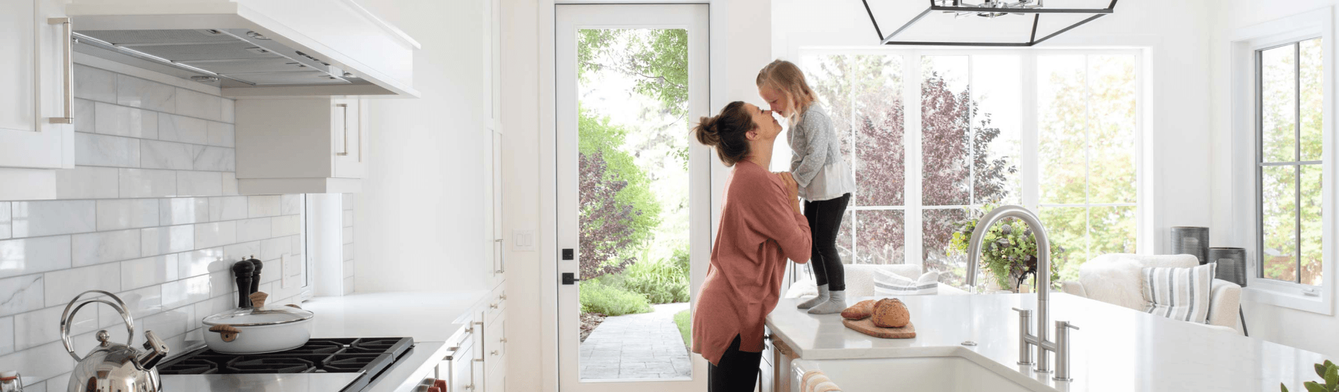 mother and daughter in kitchen