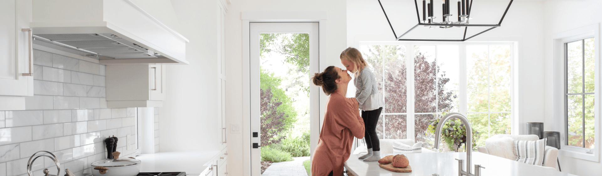 Mother and daughter in kitchen