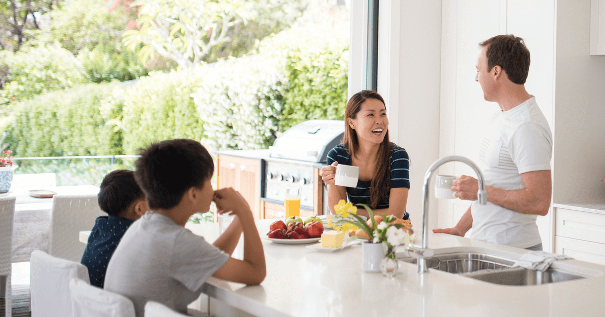 family having breakfast in the kitchen